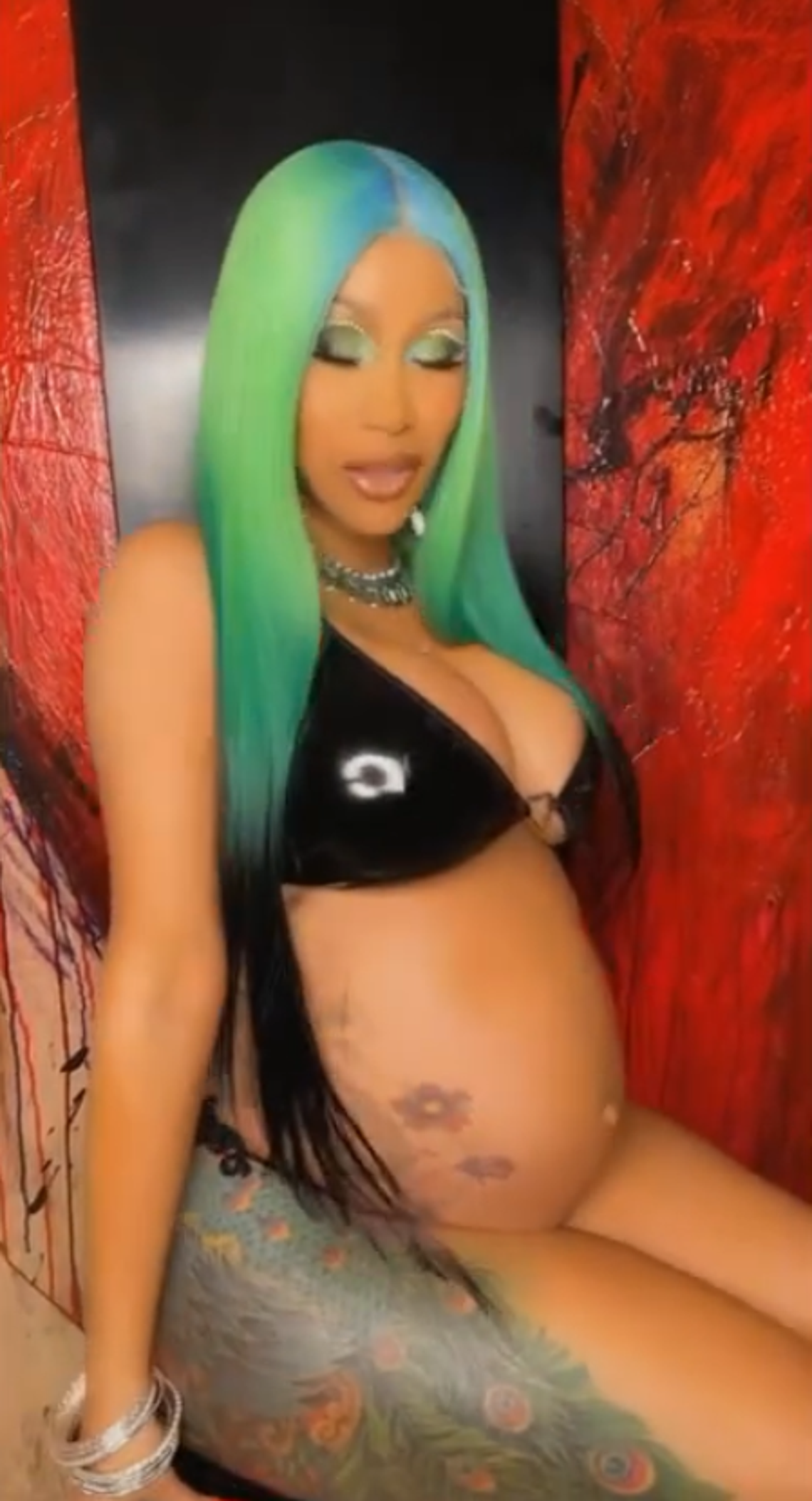 Cardi B Shows Off Growing Baby Bump in Tiny Bikinis