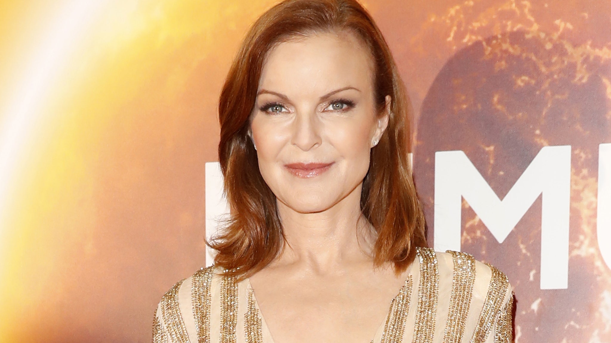 Marcia Cross pampers herself with fake eyelash application at the