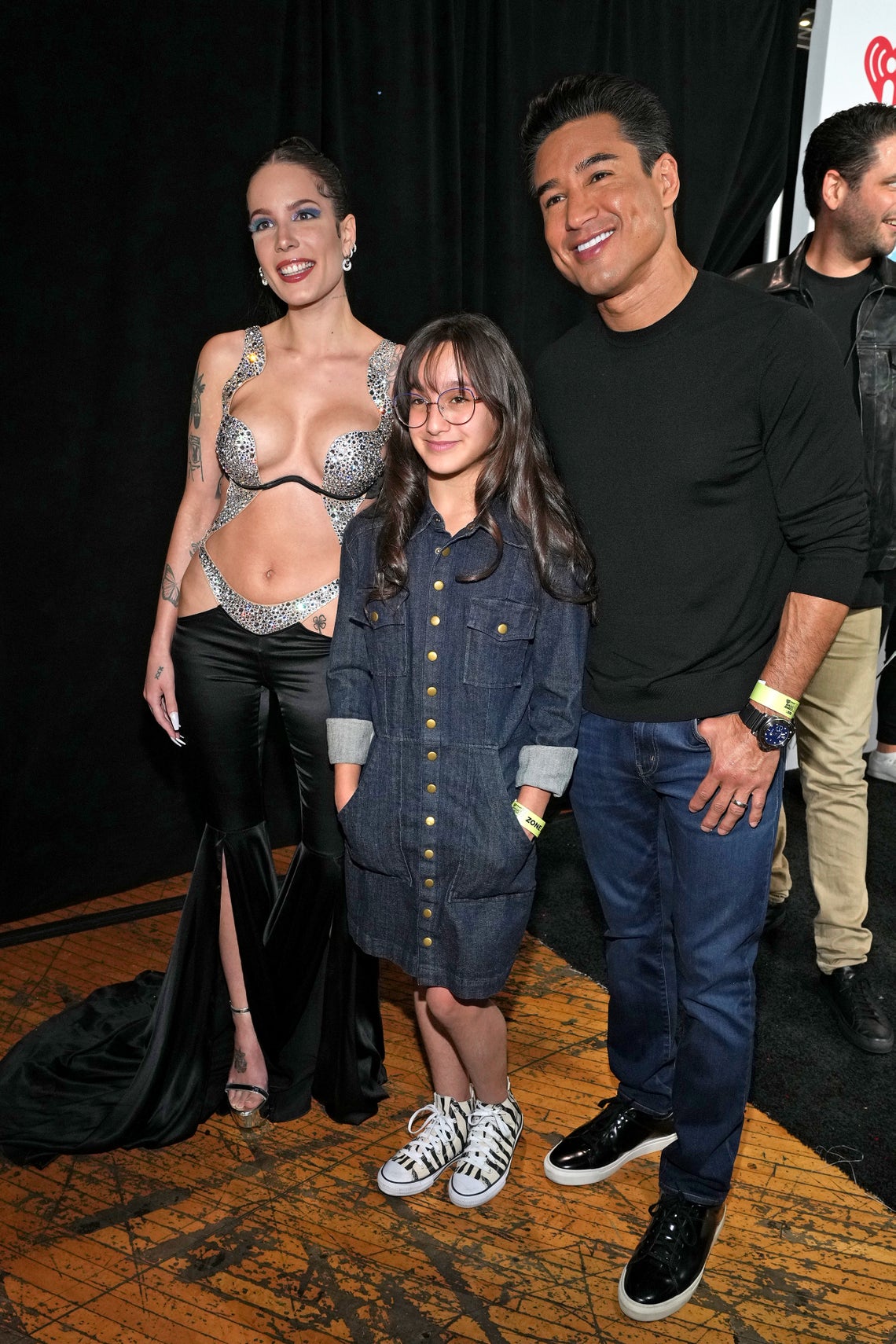 Halsey, Gia Francesca Lopez, and Mario Lopez attend the 2022 iHeartRadio Music Awards at The Shrine Auditorium in Los Angeles, California on March 22, 2022.