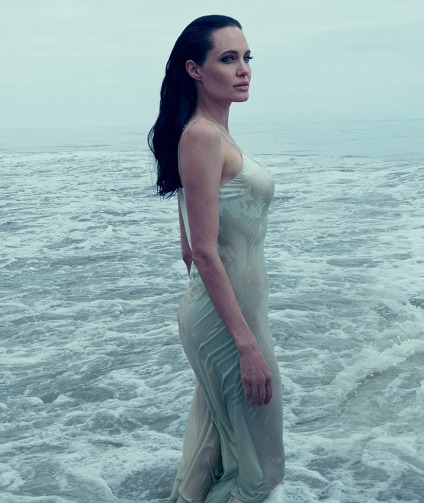 Angelina Jolie Wears Wet White Dress For Vogue, Looks Sexier Than Ever!