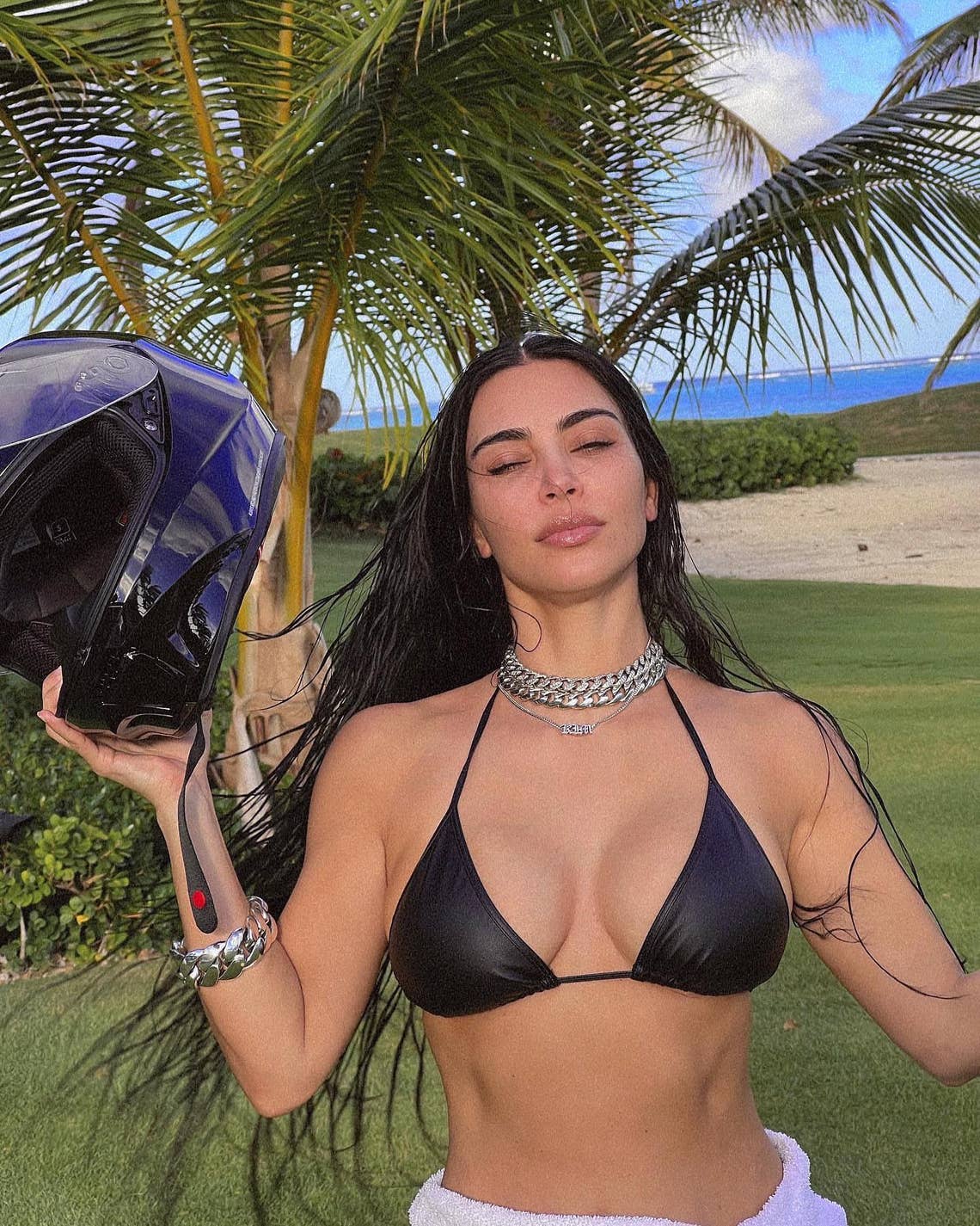 Kim Kardashian shared a series of sexy bikini photos of herself posing with a motorcycle helmet. "Always ready!" she captioned the pics.