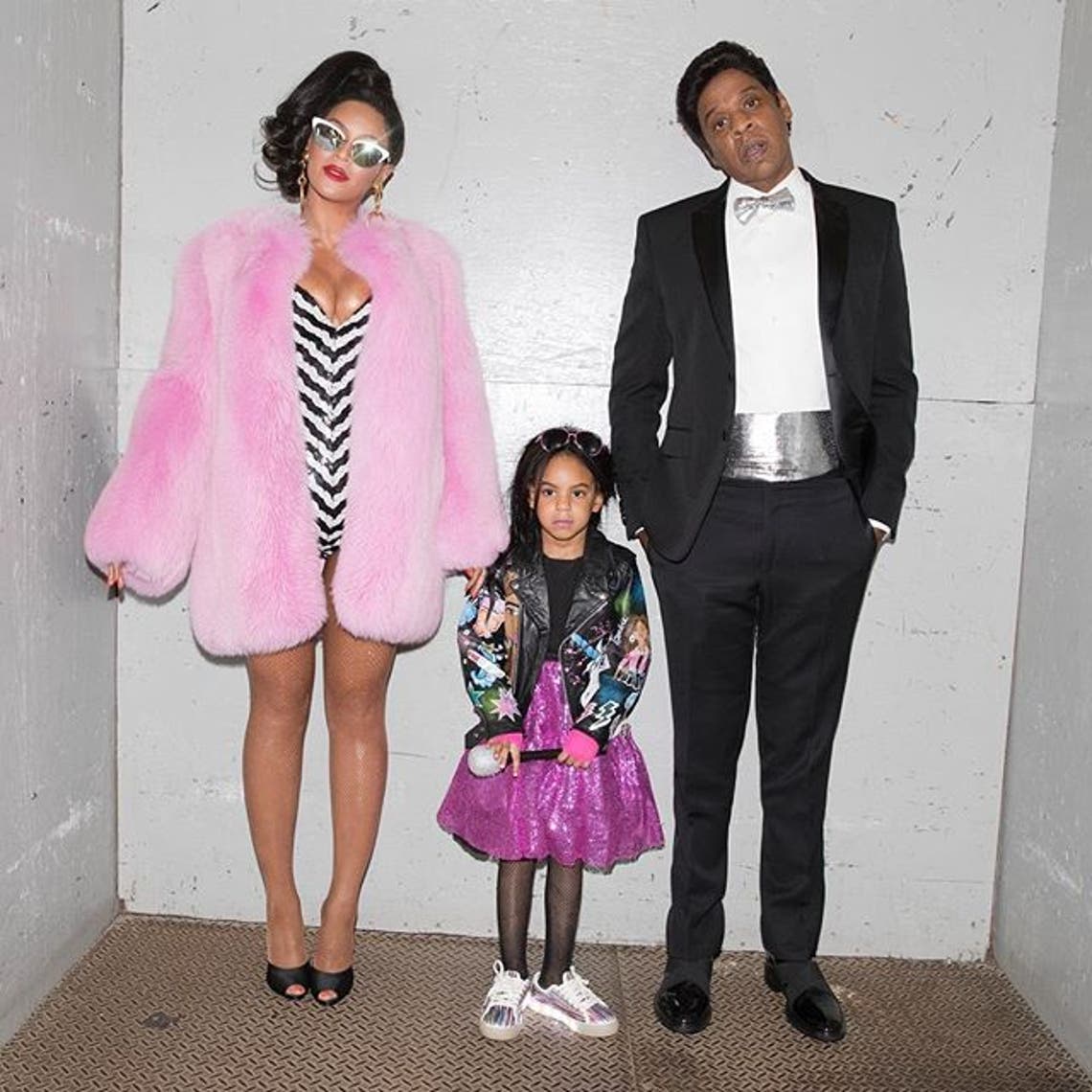 BeyoncÃ'© and Jay-Z as Barbie and Ken, with daughter Blue Ivy as a live doll.