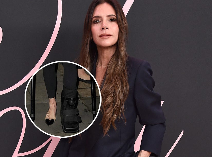 Victoria Beckham Wears One Heel While Walking on Crutches After
Breaking Foot