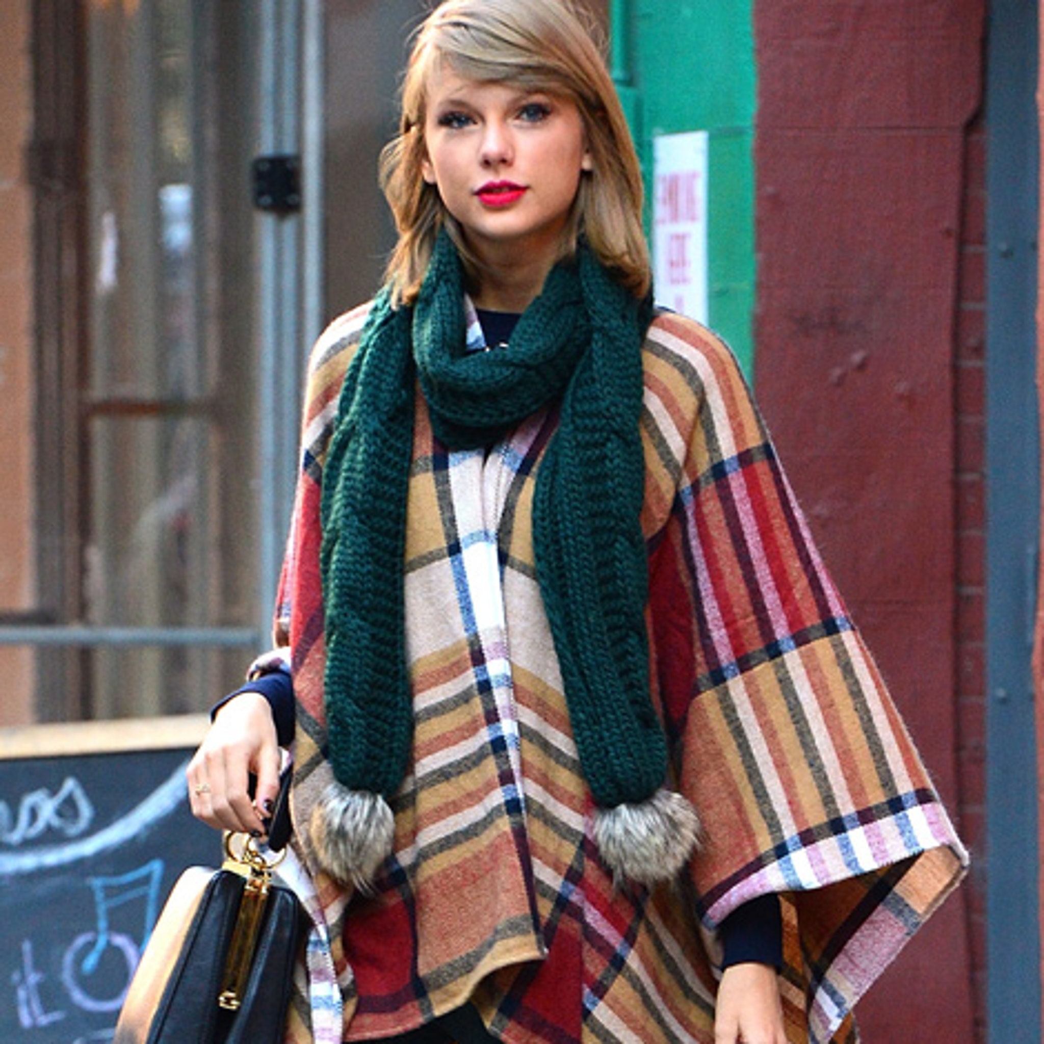 Emma Roberts Wears Sexy Leopard Scarf and Gets Smooched in NYC