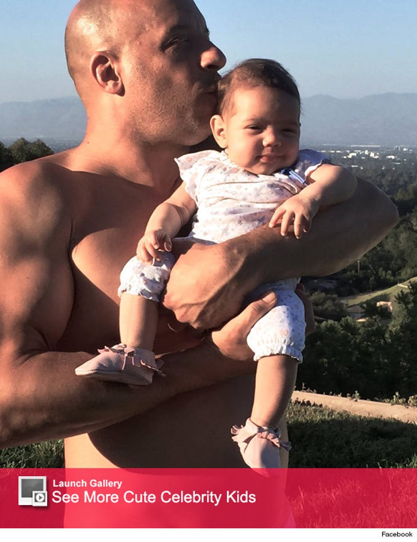 Vin Diesel Shares Shirtless Pic Holding Baby Pauline Following Body-Shaming