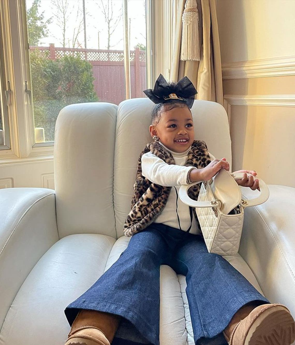 Cardi B's Baby Girl Kulture Adorably Models Her Earrings and $4k Bag