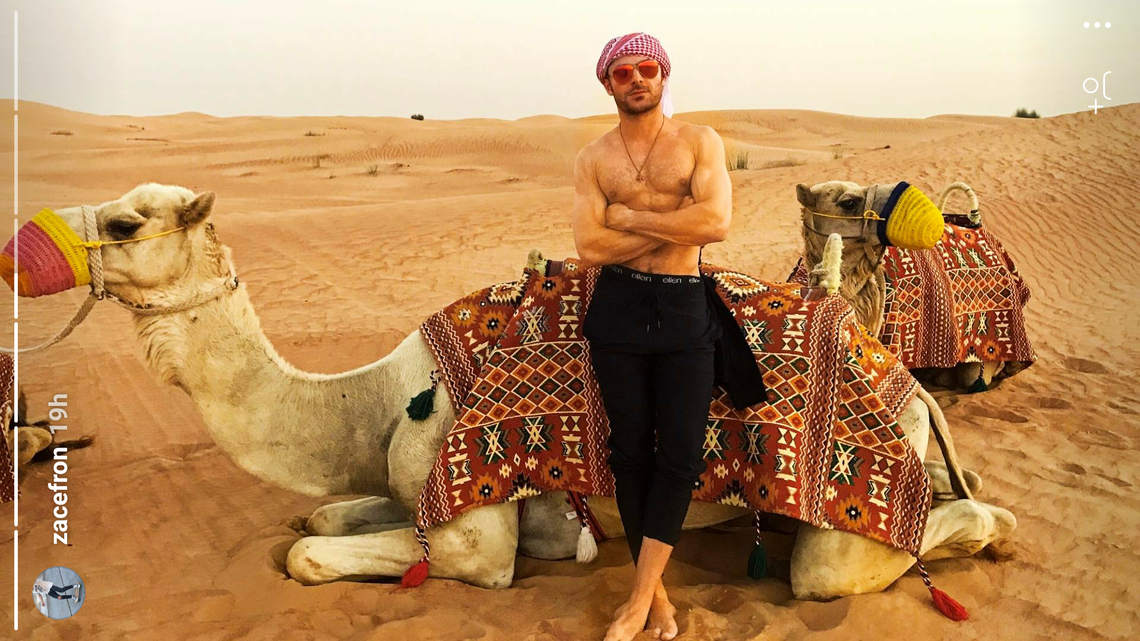 Zac Efron rocks Ellen boxers while riding a camel with friends in an Instagram story (April 4, 2017).