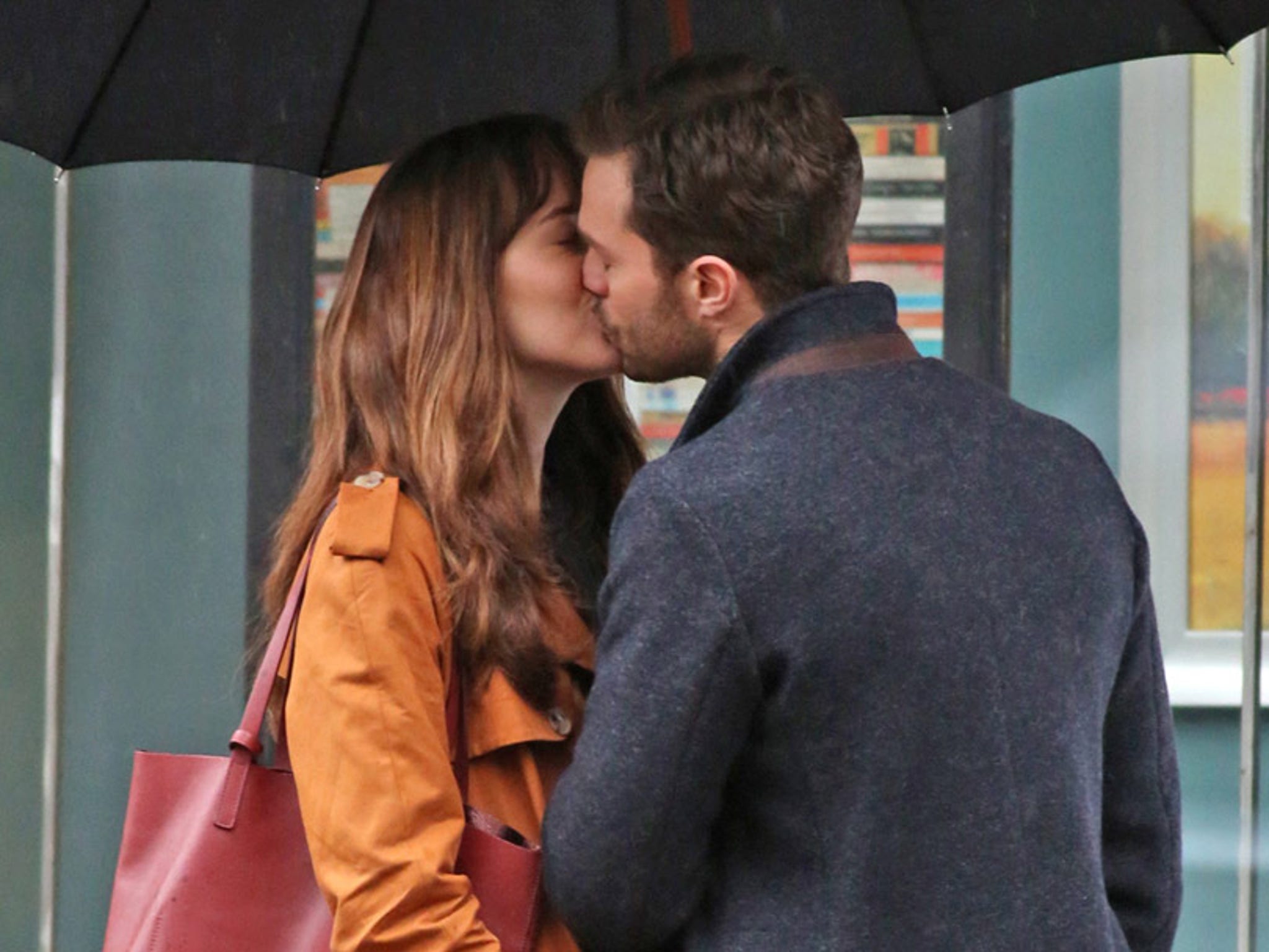 See Dakota Johnson and Jamie Dornan's Steamy First Kiss in "Fifty Shades  Darker"