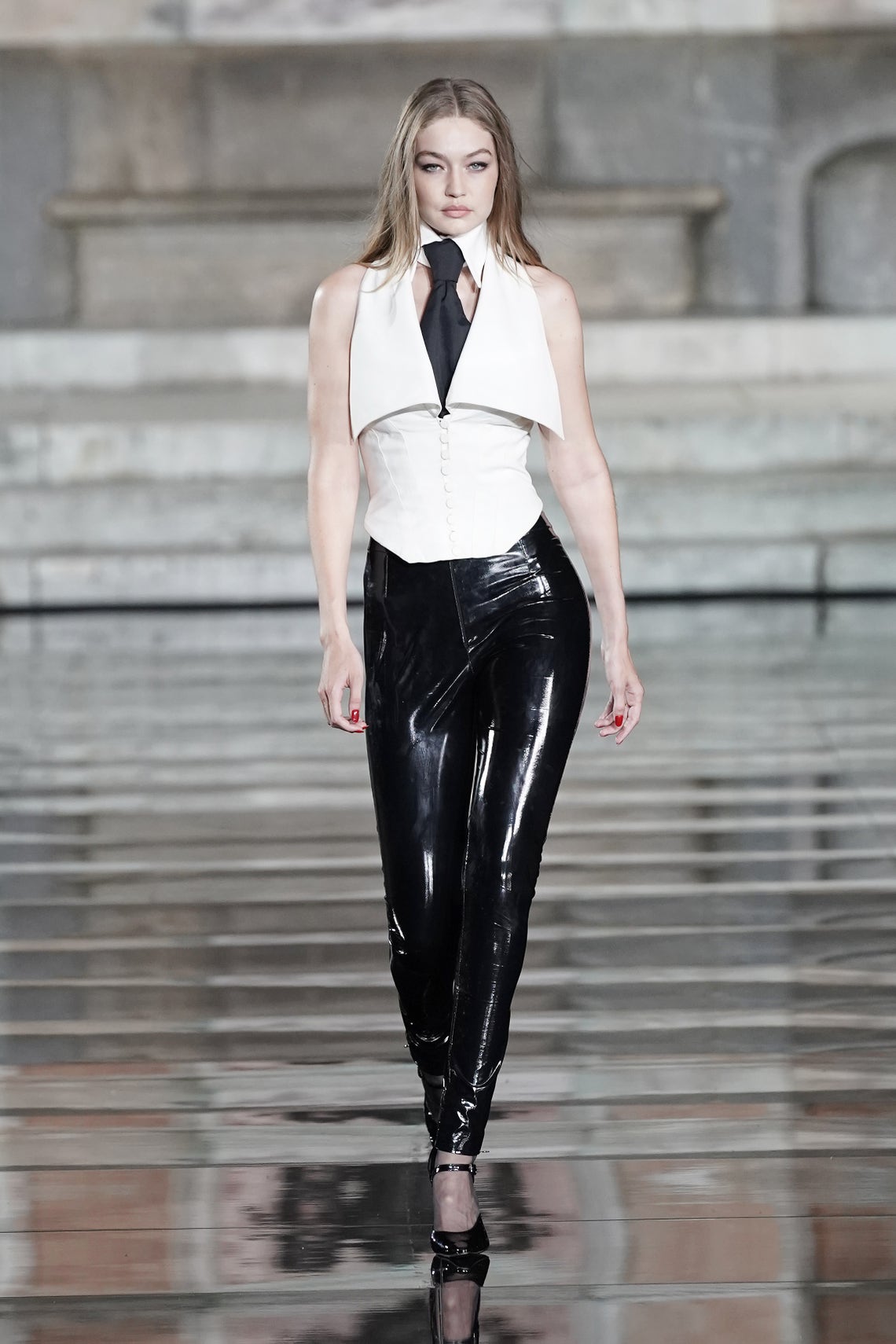 Gigi Hadid walks the runway, wearing Ermanno Scervino, at the CR runway x LUISAVIAROMA 90th Anniversary Show during Pitti Immagine Uomo 96 on June 13, 2019 in Florence, Italy.