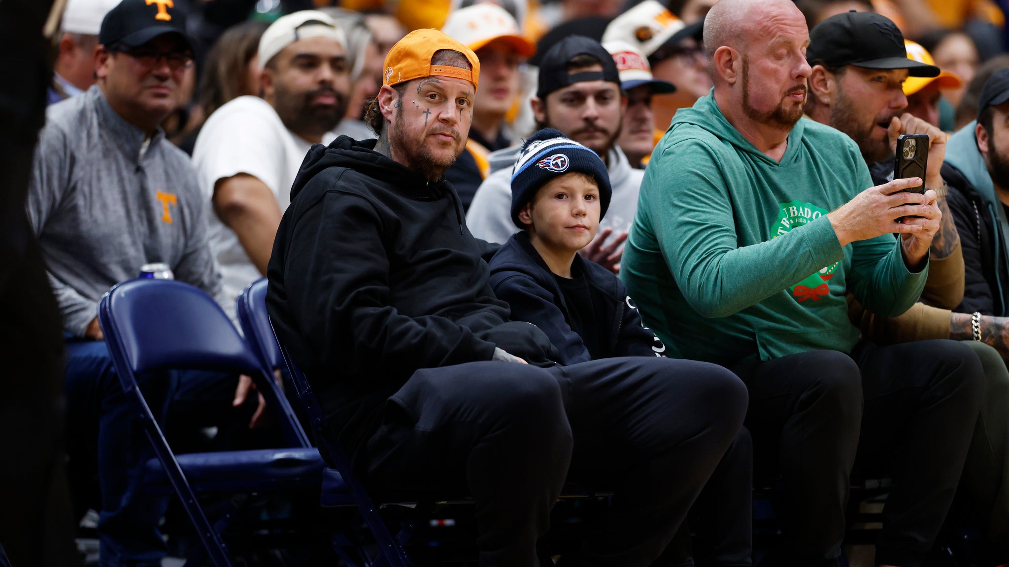Jelly Roll Makes Rare Appearance With 9-Year-Old Son Courtside