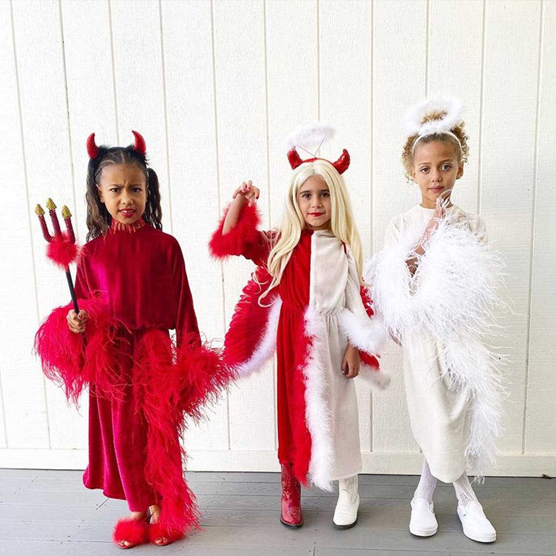 North West and Penelope Disick with their friend.