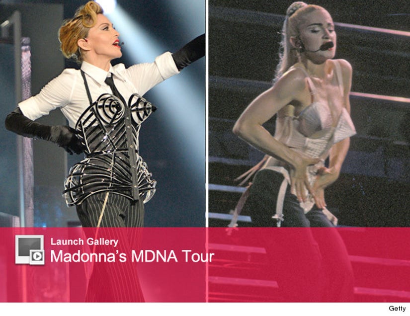 Madonna Brings Back The Cone Bra, Dresses As A Cheerleader For MDNA Tour