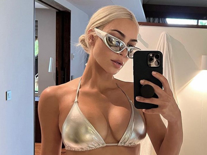 Kim Kardashian Gets Retro Blonde Bombshell Makeover For New Sizzling SKIMS  Swimwear Ad