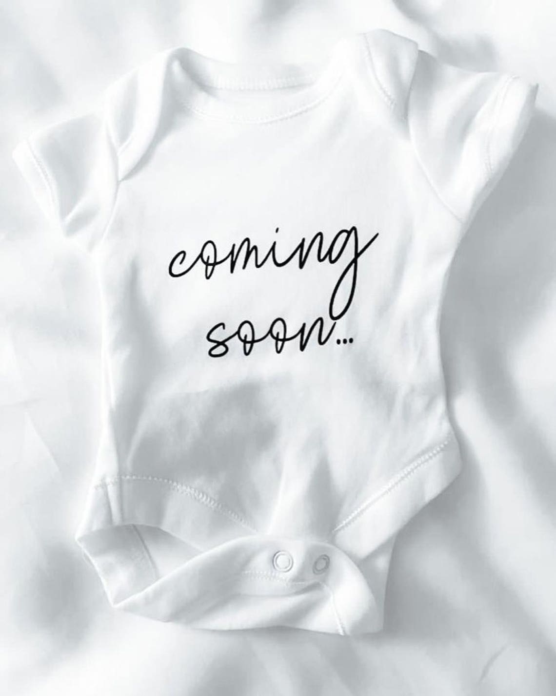 Tie Breaker Coming Soon Onesie