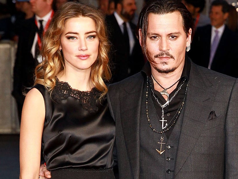 Amber Heard Granted Restraining Order Against Johnny Depp, Claims ...