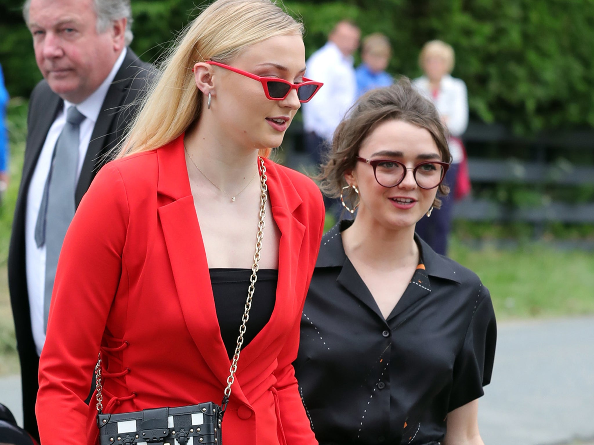 Sophie Turner Attended Kit Harington and Rose Leslie's Wedding in a Red  Minidress and Thigh-High Boots