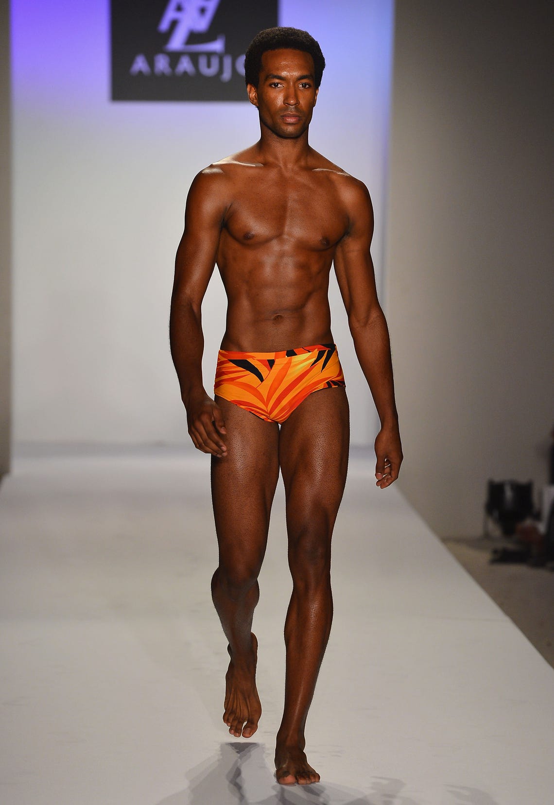 Quebec,Canada. A male model poses the runway at the Once Again fashion show  held during the Fashion and Design Festival in Montreal Stock Photo - Alamy