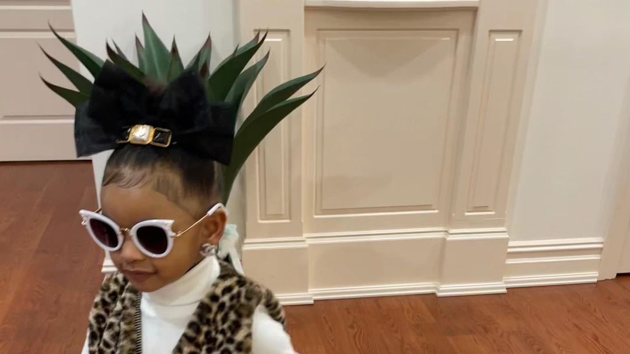 Cardi B's 2-year-old daughter poses with her new $4,212 Dior handbag and  Chanel earrings after the star spent more than $26,600 to shop for her