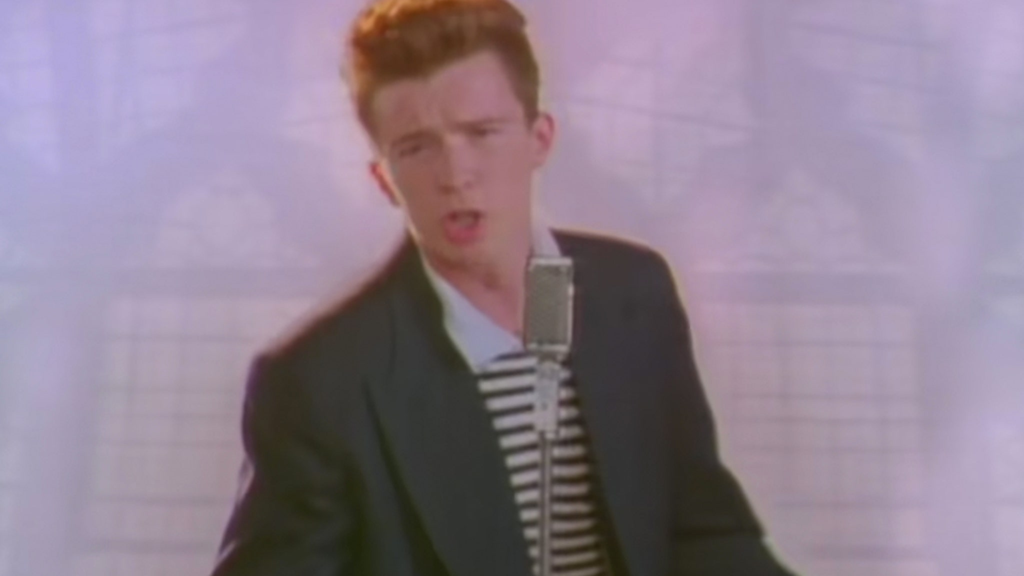 Rick Astley Recreates 'Never Gonna Give You Up' Video for AAA Commercial -  Nerdist
