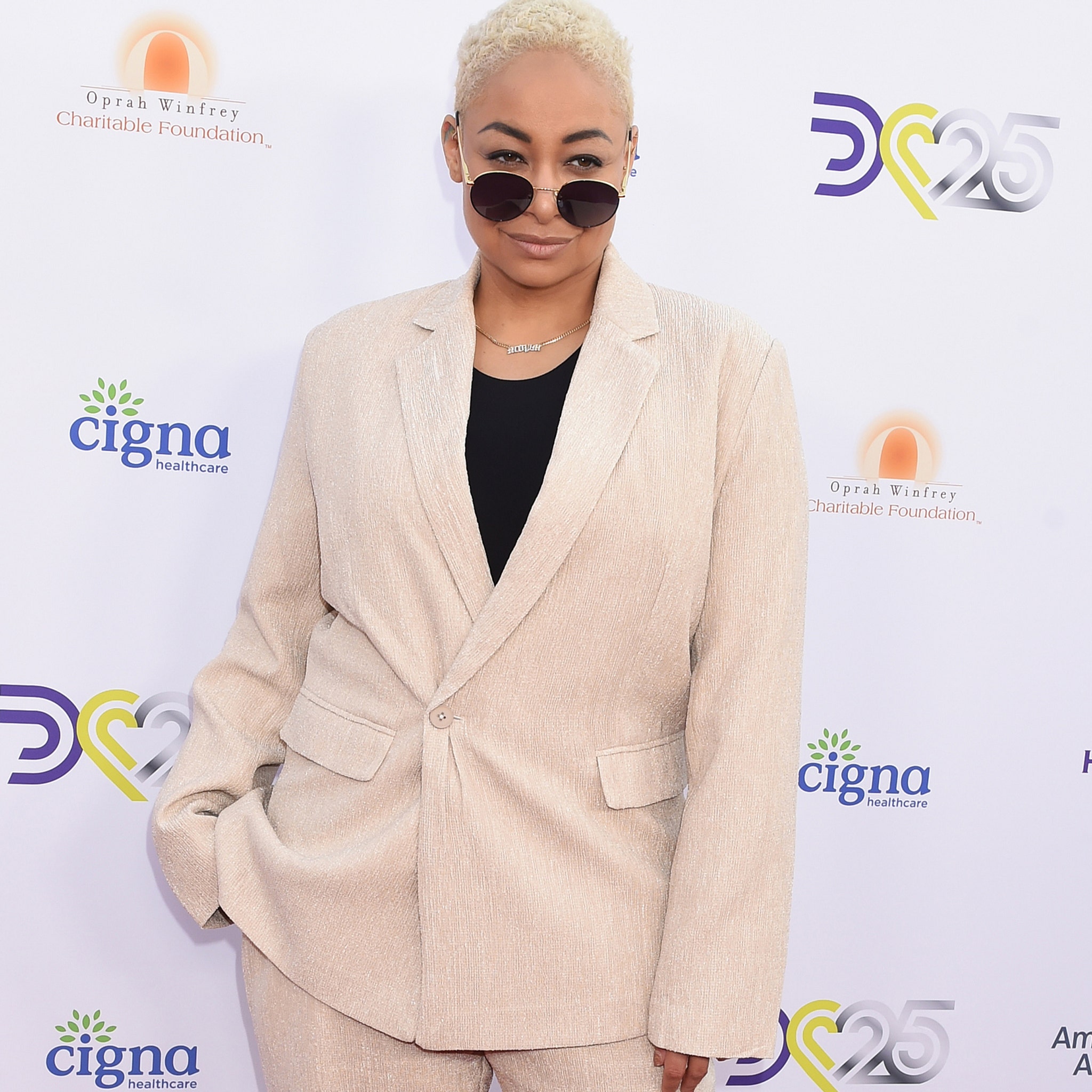 Raven-Symoné Reveals She Had Lipo, Two Breast Reductions Before She Was 18 I Got a Twofer photo