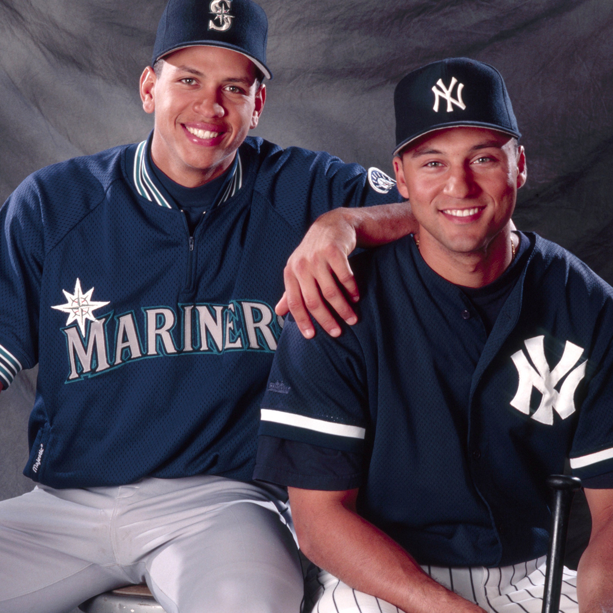 New York Yankees Alex Rodriguez and Derek Jeter (R) stand in the
