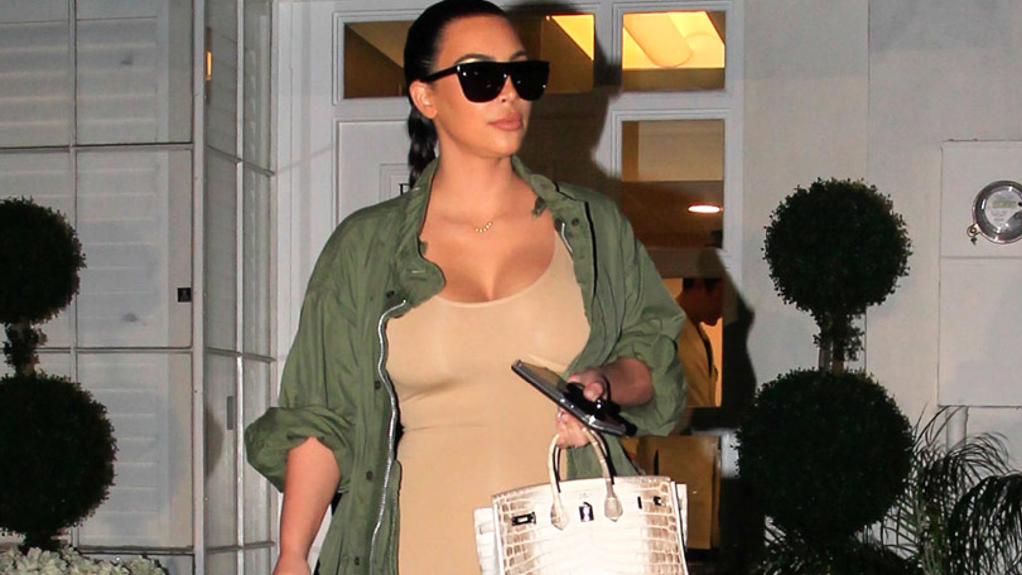 Kim Kardashian Flaunts Slimmed Down Post Baby Bod In Nude Jumpsuit