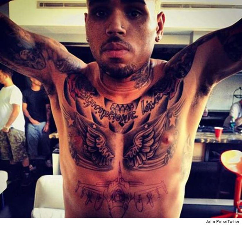 Chris Brown His Tattoo Is Art  E Online