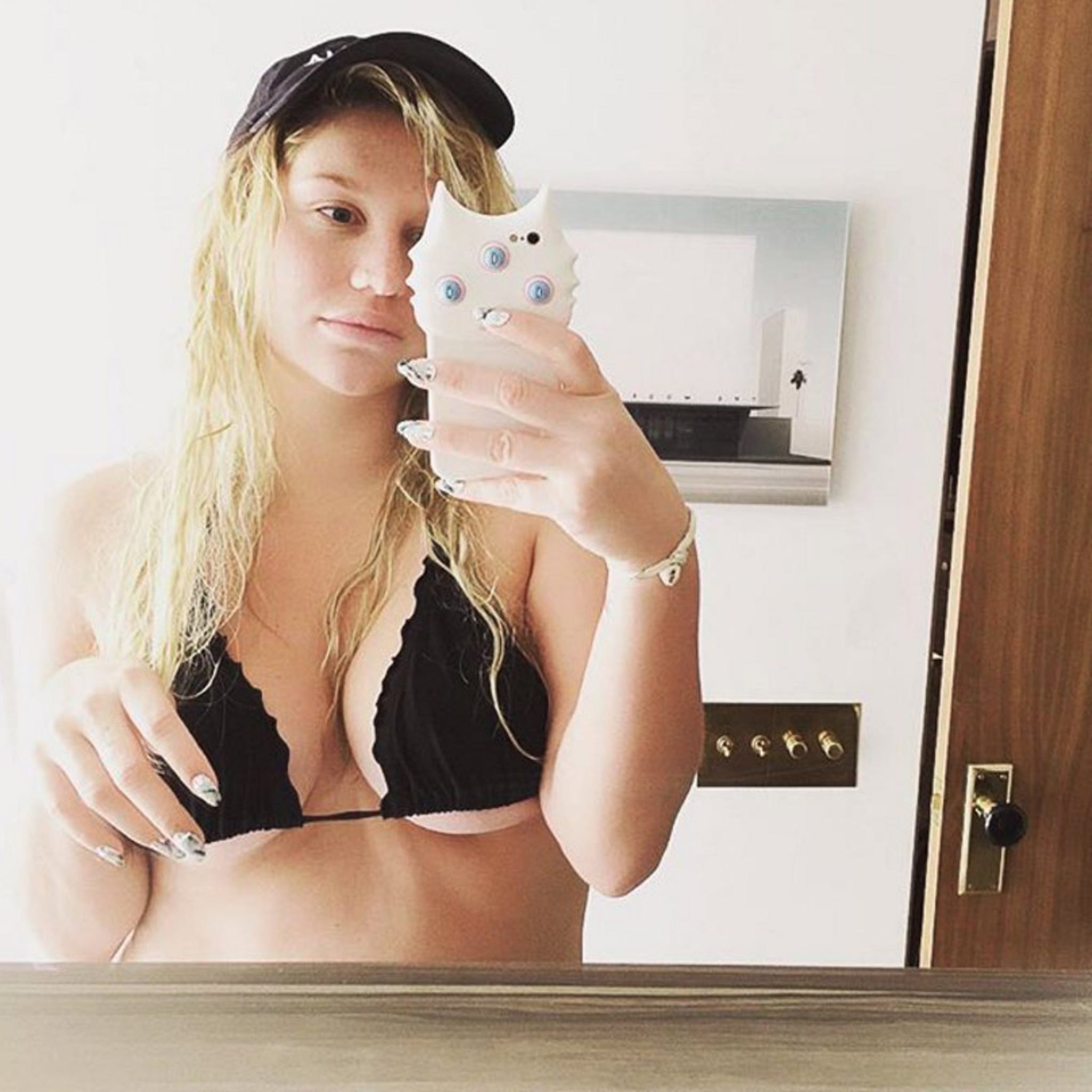 Kesha Goes Makeup-Free As She Nearly Pops Out of Too Small Bikini Top