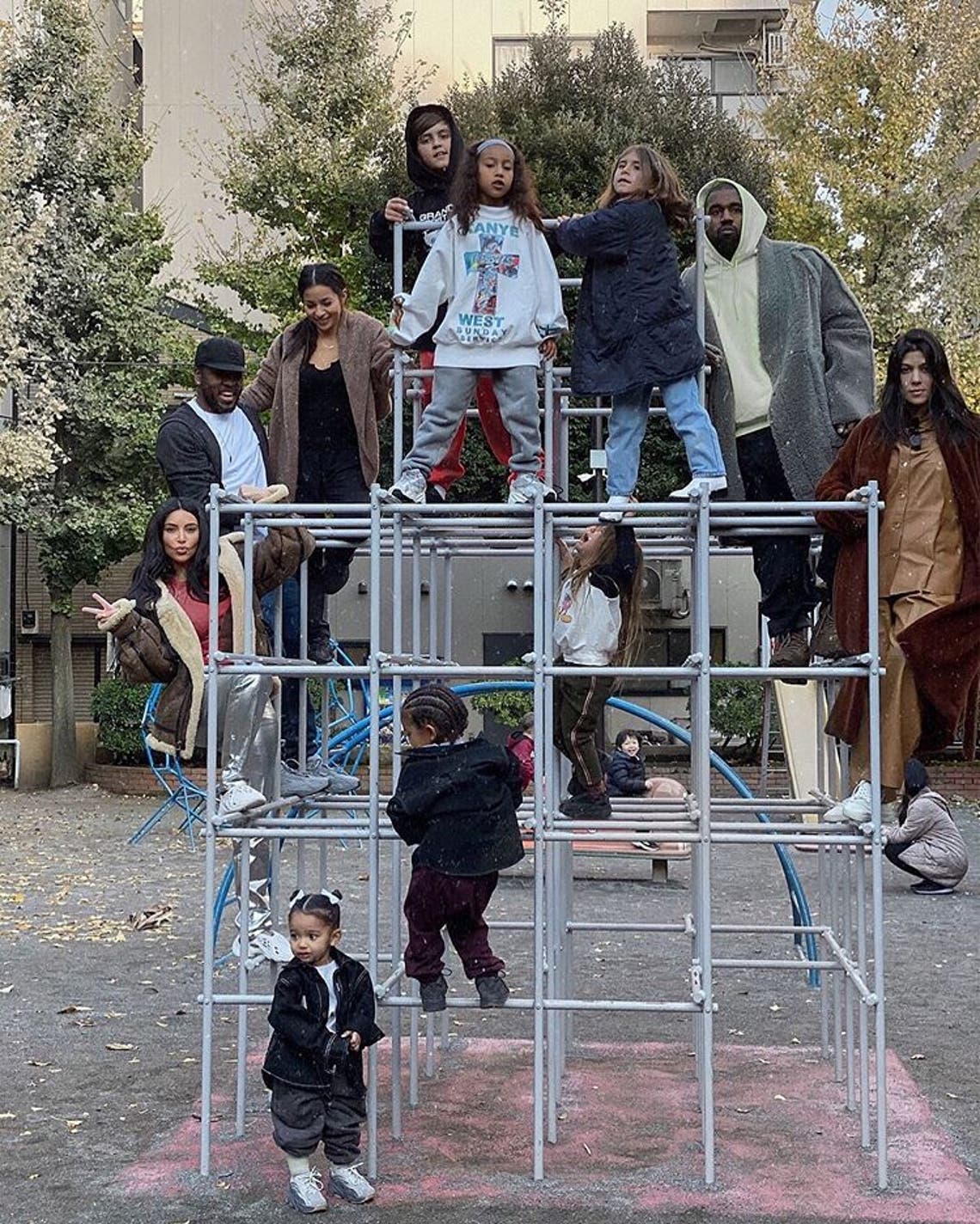 "So many moods #Tokyo" Kim Kardashian. After everyone zeroed in on Reign's screaming face, Kourtney commented, "someone was standing on his fingers."