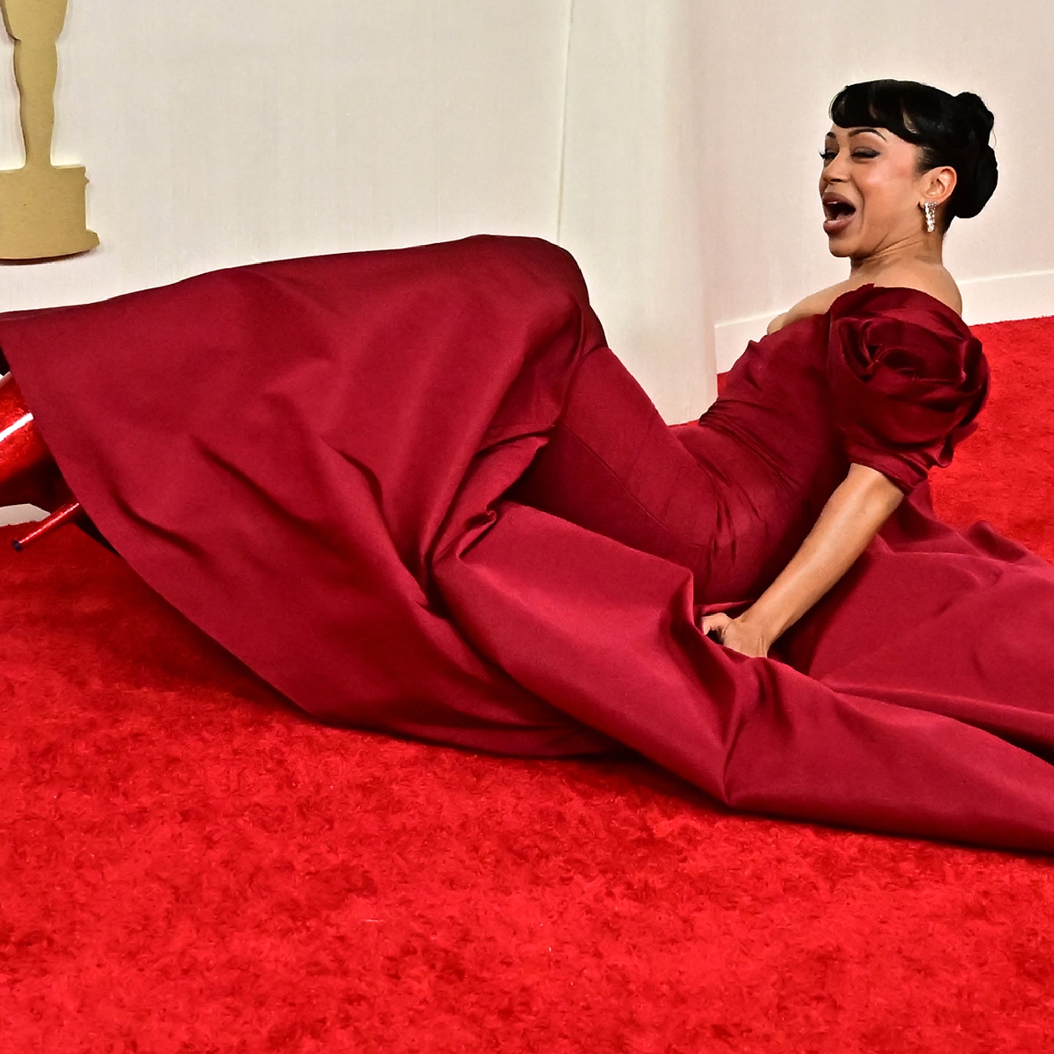 Video: Liza Koshy Falls to Ground While Walking Oscars Red Carpet