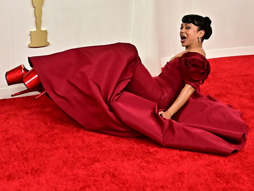 Video: Liza Koshy Falls to Ground While Walking Oscars Red Carpet
