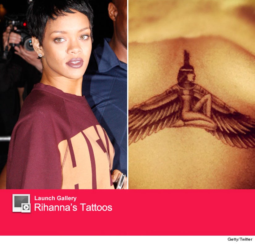 Rihanna REPLACES matching Drake shark tattoo with new ink  Daily Mail  Online