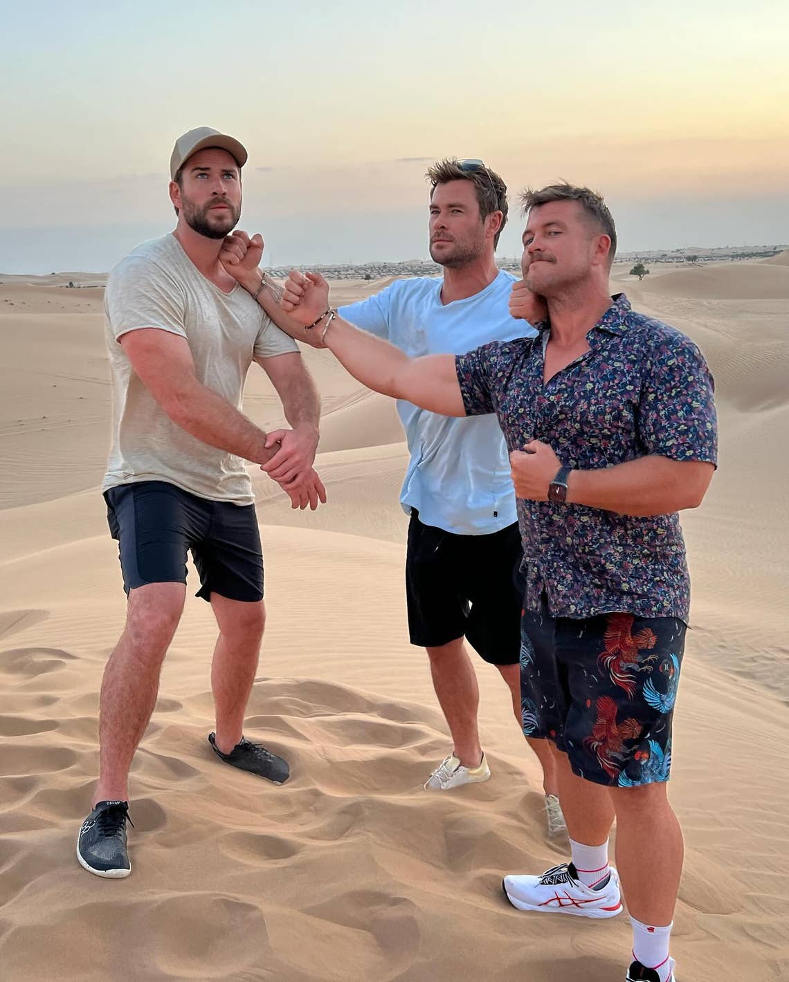 "A few snaps from an epic family trip to #abudhabi @lukemun @hemsworthluke @liamhemsworth @visitabudhabi" - Chris Hemsworth, Luke Hemsworth and Liam Hemsworth