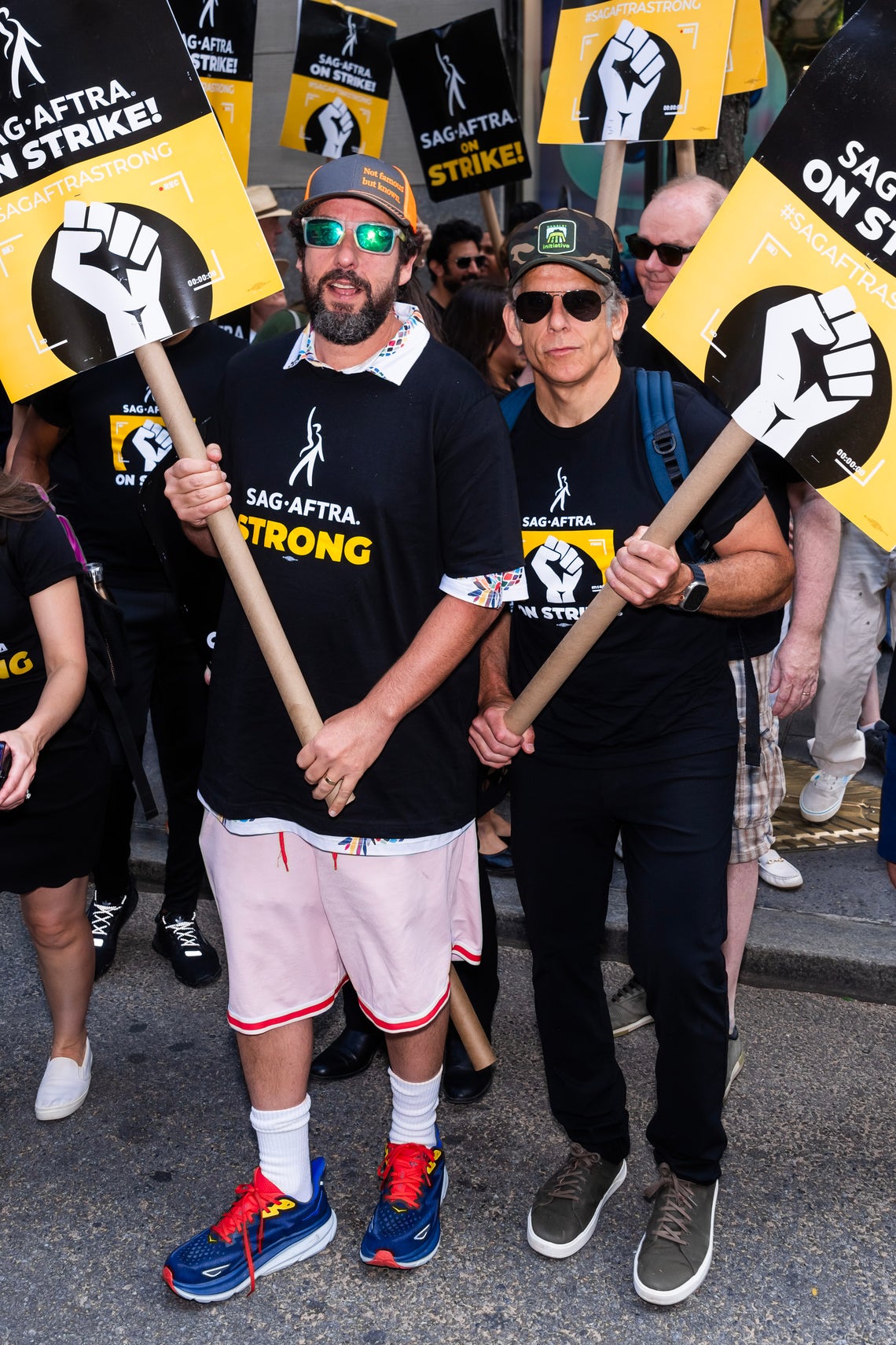 Adam Sandler and Ben Stiller are seen at the SAG-AFTRA strike in Midtown on August 2, 2023 in New York City.