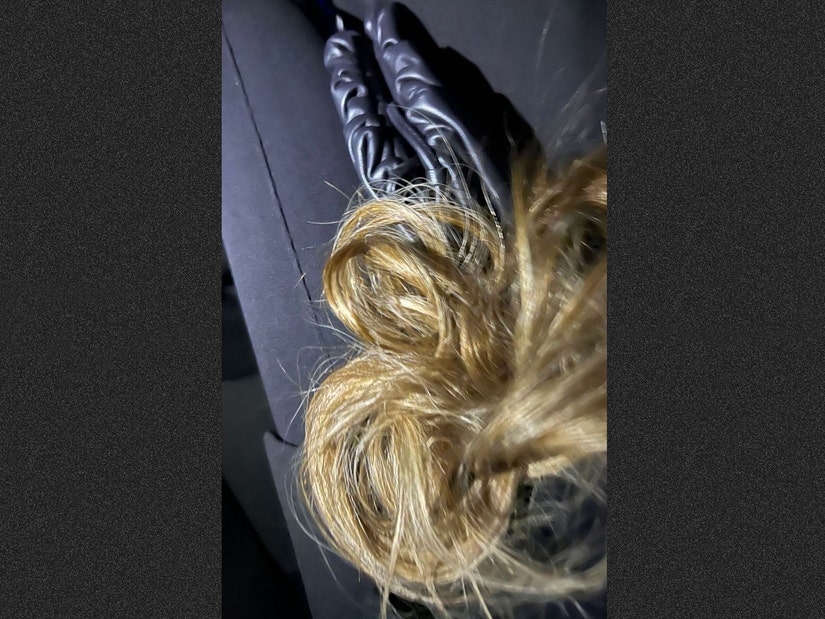 Khloé Kardashian exposes tangle of post-awards hair extensions