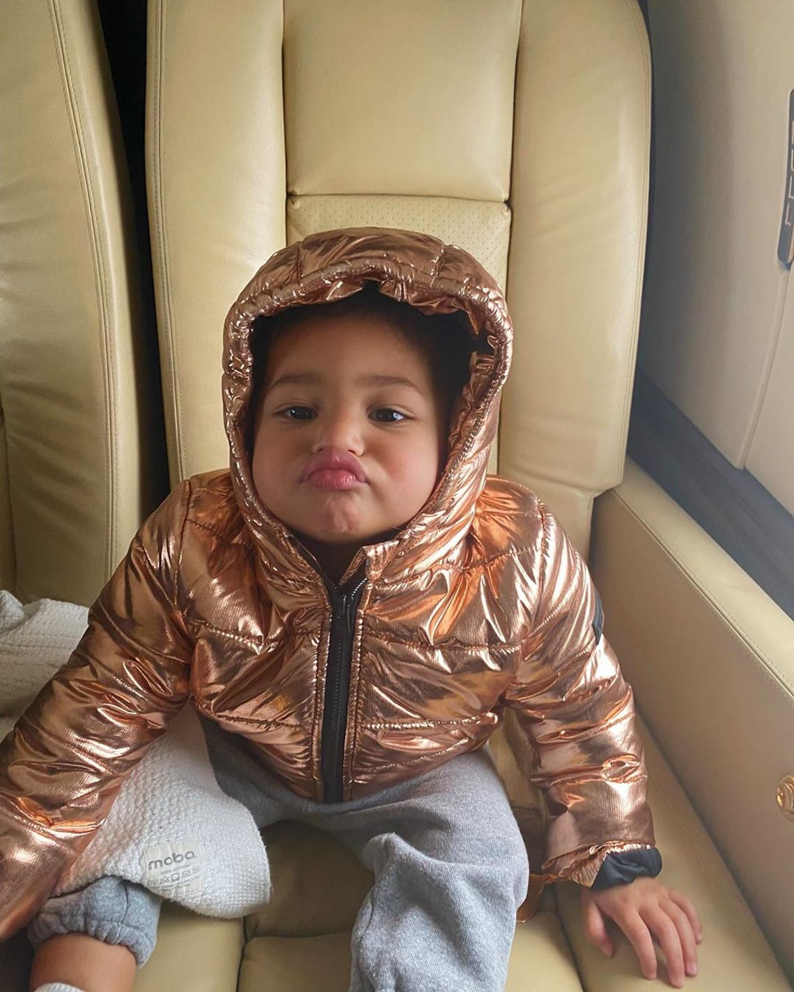"cutest travel buddy" Kylie Jenner