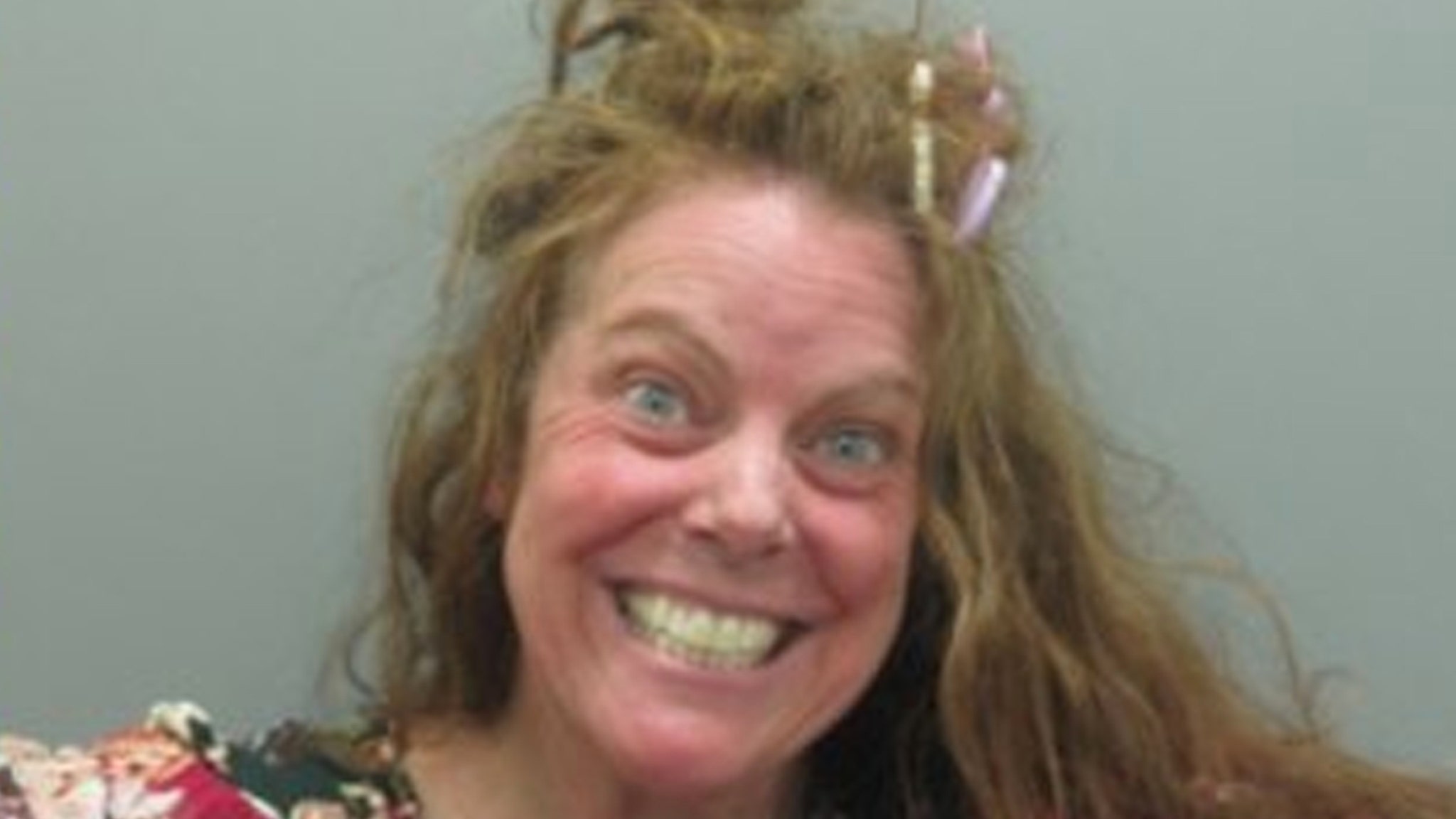 'Witch' Smiles In Mugshot After Allegedly Setting Stranger's Porch on Fire