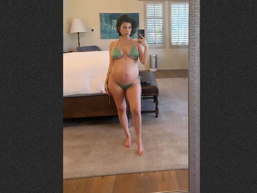 Pregnant Kourtney Kardashian Flaunts Bare Baby Bump in New Bikini Photos