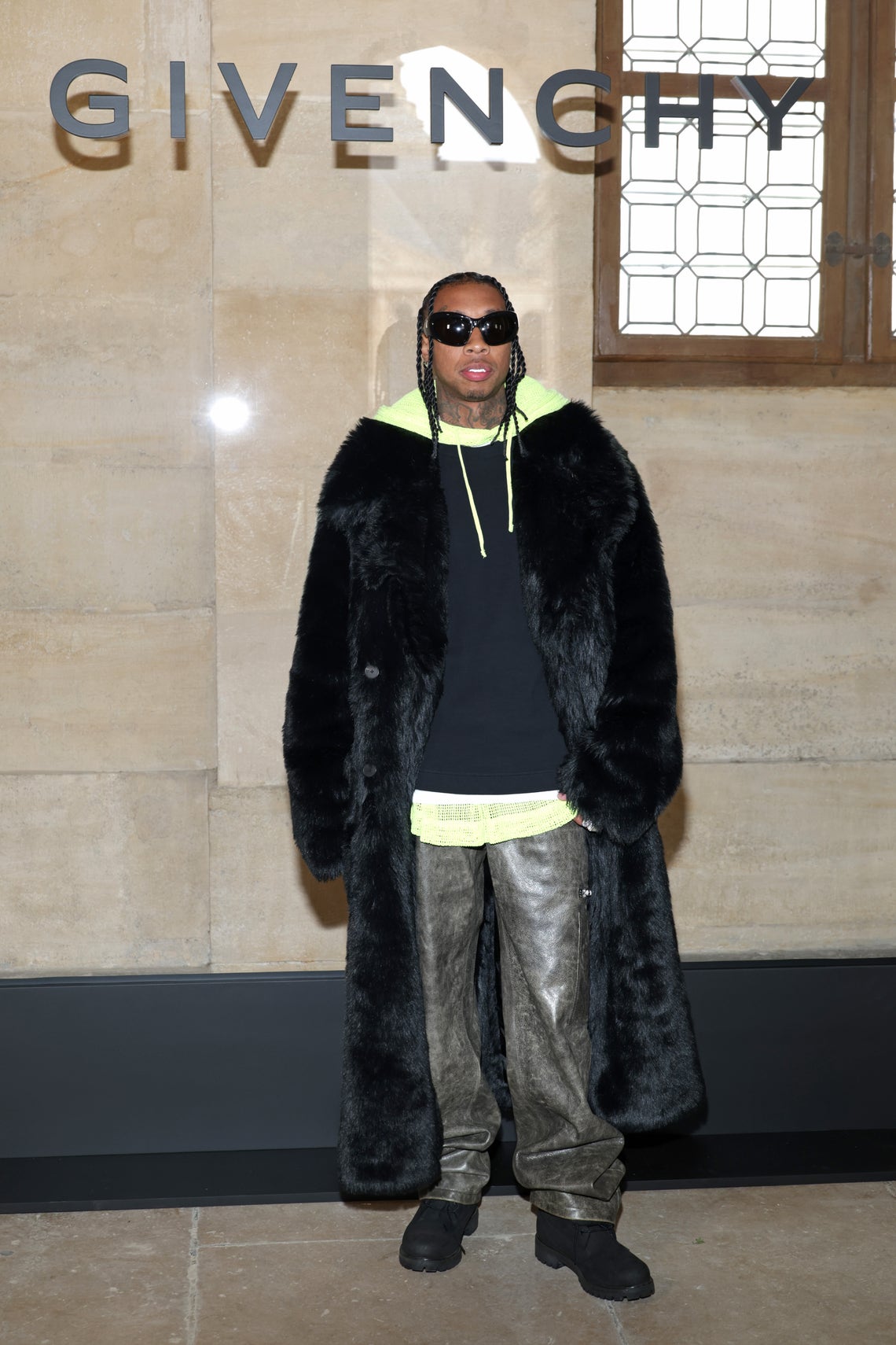 Tyga attends the Louis Vuitton Menswear Spring Summer 2023 show as