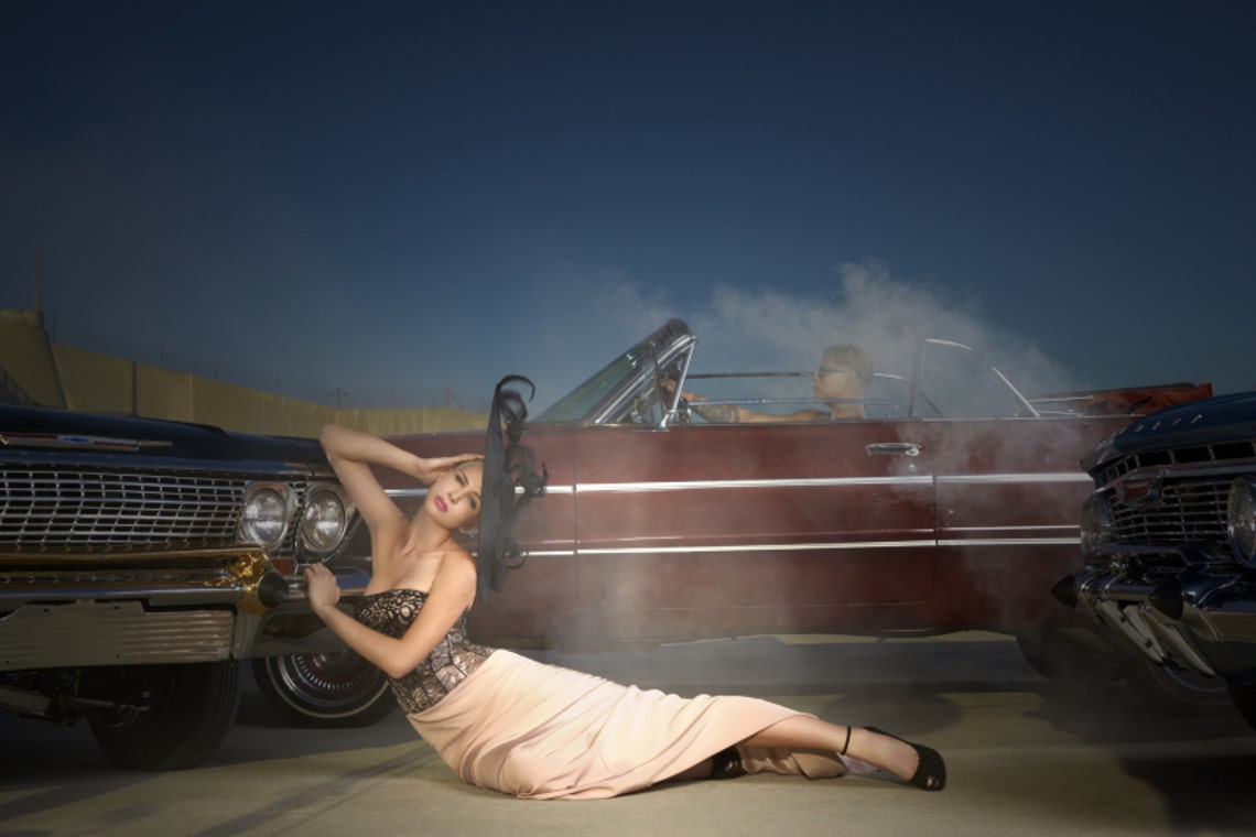 Young Woman Posing in an Old Abandoned Car · Free Stock Photo