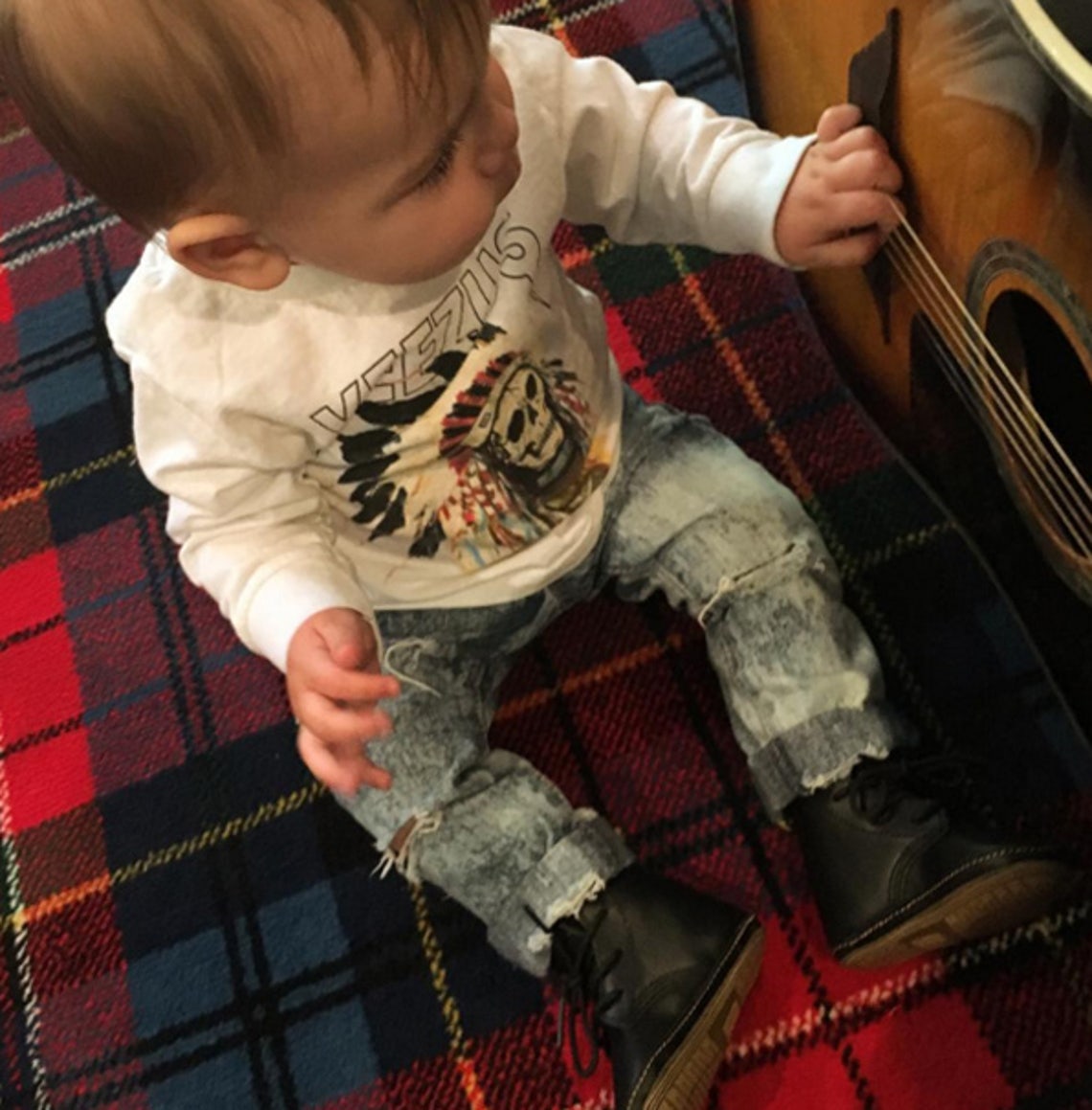 Kourtney Kardashian's son, Reign, shows off his Yeezus swag (December 3, 2015).