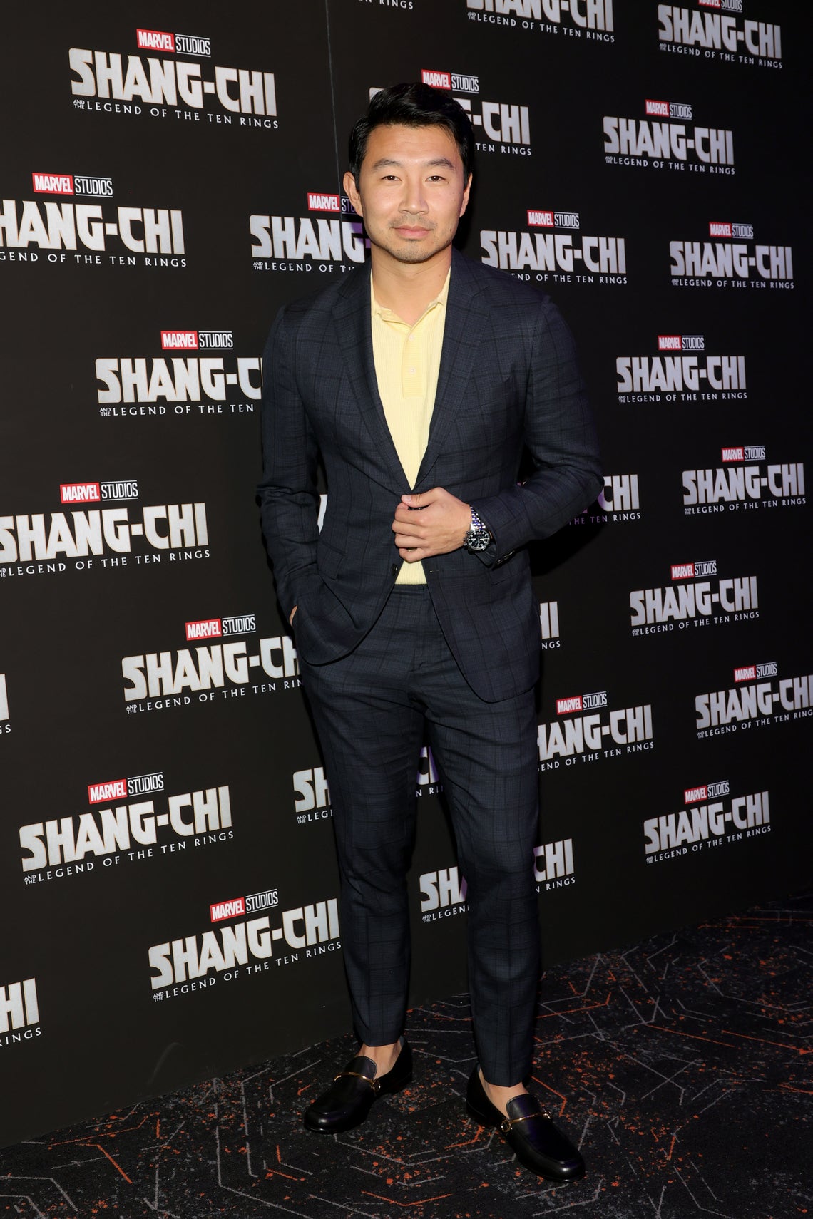 Simu Liu walks the red carpet at a special NYC screening of "Shang-Chi and the Legend of the Ten Rings" on August 30, 2021.