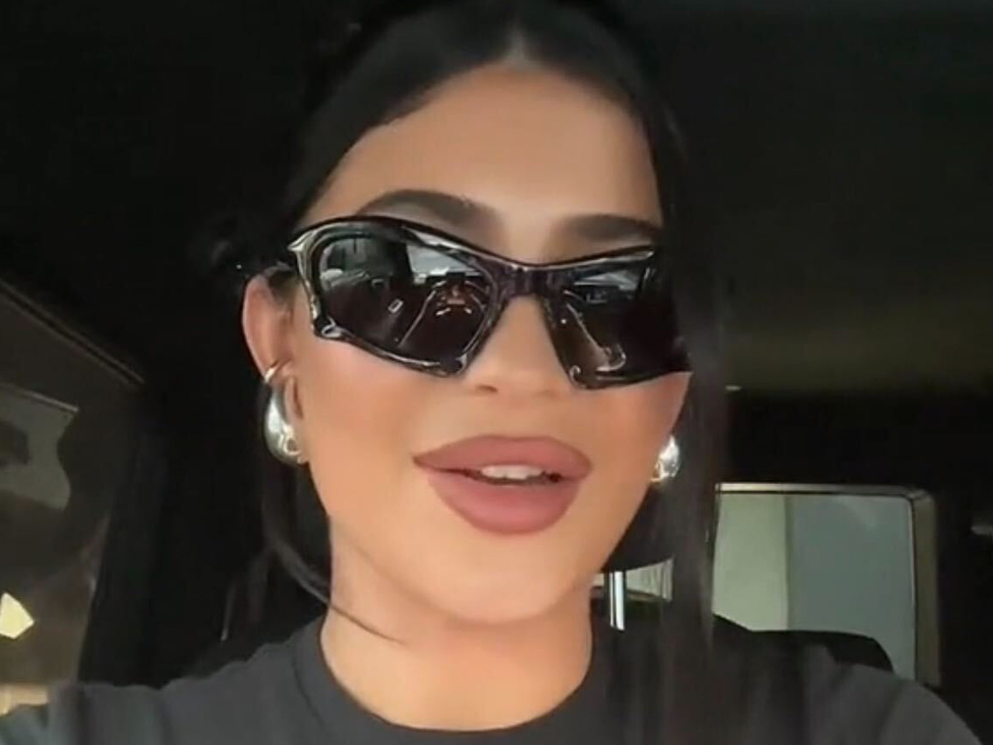 Kylie Jenner Lactates Through Her Shirt in Car TikTok Makeup Video