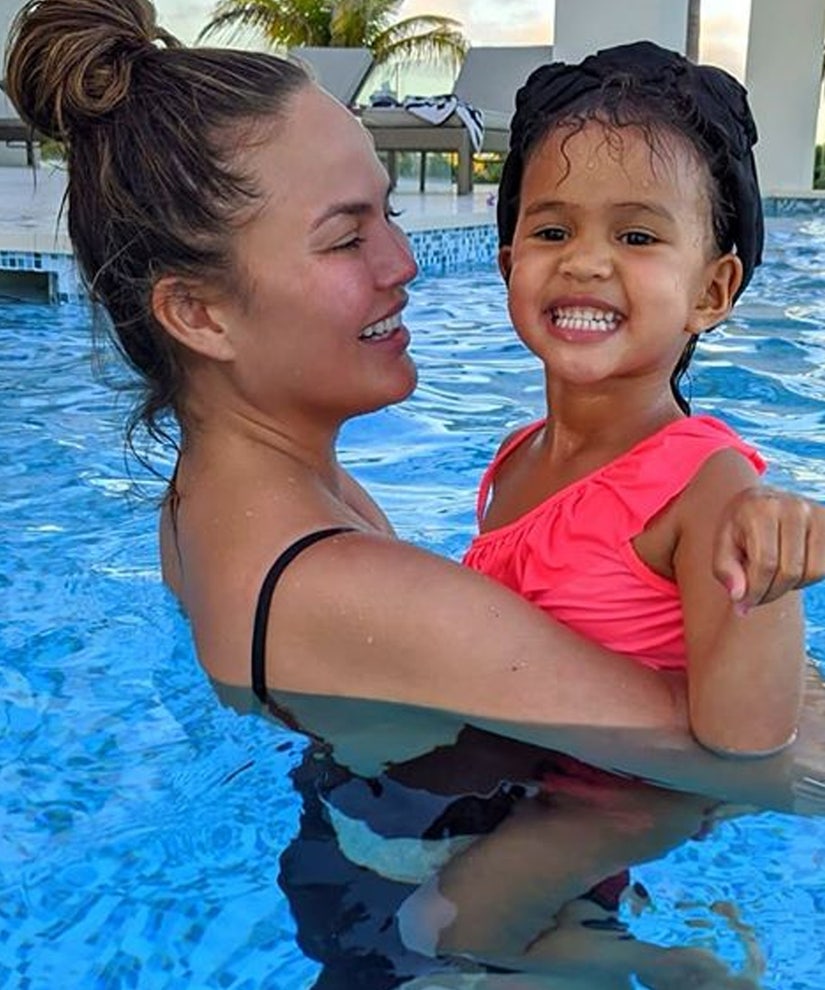 Chrissy Teigen Celebrates Her Breast Implant Removal With A Boob Cake