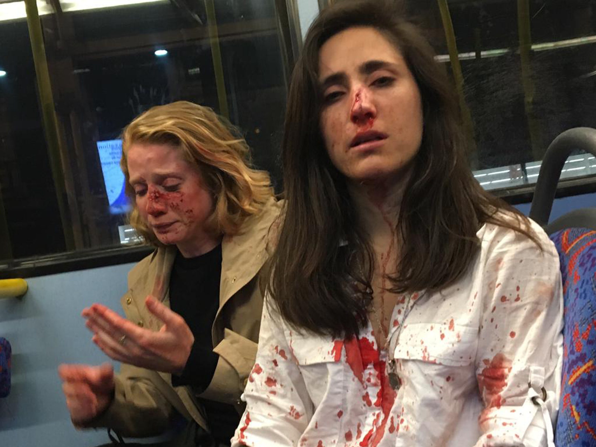 Lesbian Couple Attacked by Mob for Refusing to Make Out on Bus -- Four  Suspects Now in Custody