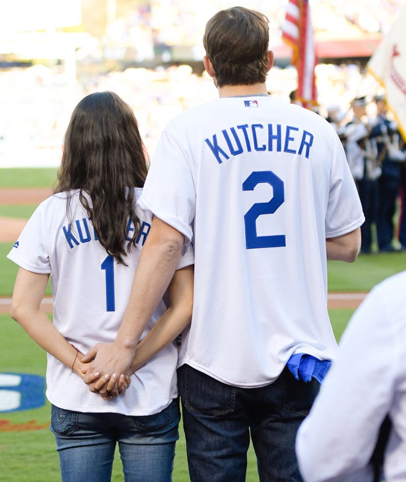 Pregnant Mila Kunis Brings Huge Baby Bump to Dodgers Game with