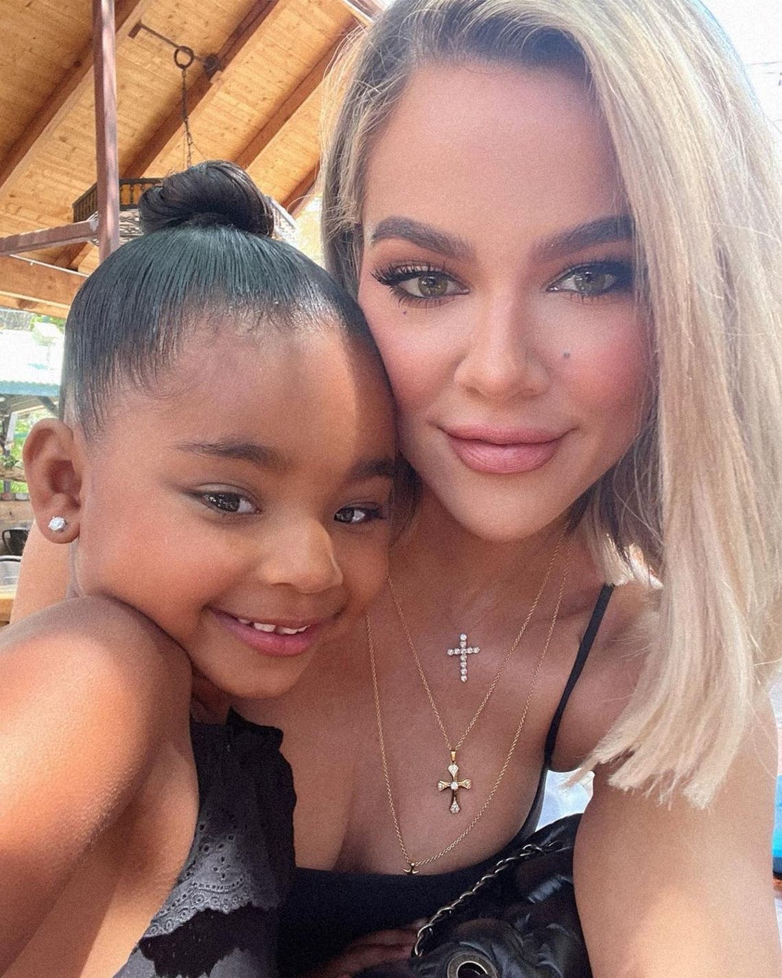 Khloé Kardashian's Daughter True Snuggles with Pet Cat in New Photos