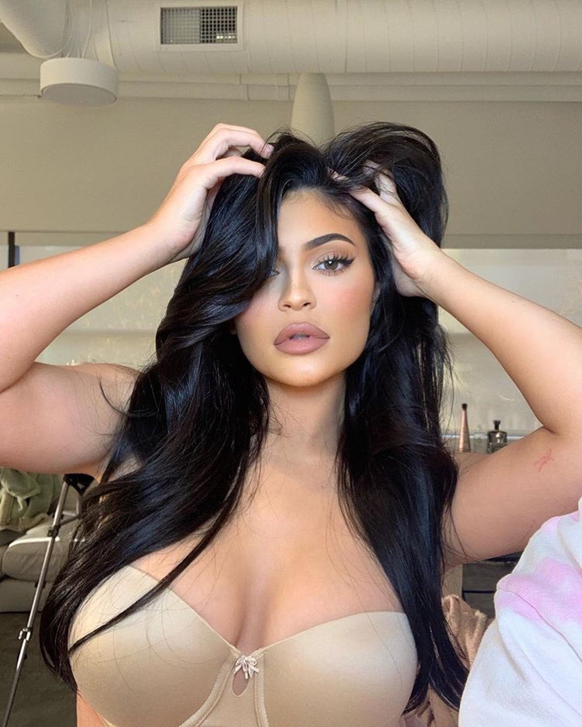 Kylie Jenner Strips Down Nearly Nude While on Set at Kylie Cosmetics