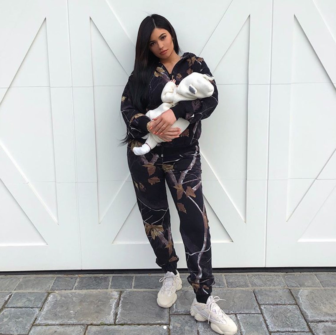 "angel baby is 1 month old today" Kylie Jenner shares photo of daughter Stormi.