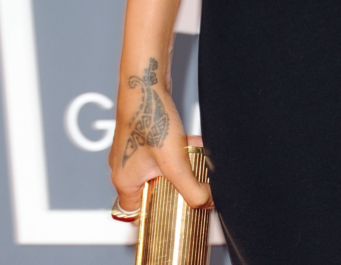 Rihanna covers up her shark tattoo that matched ex Drakes